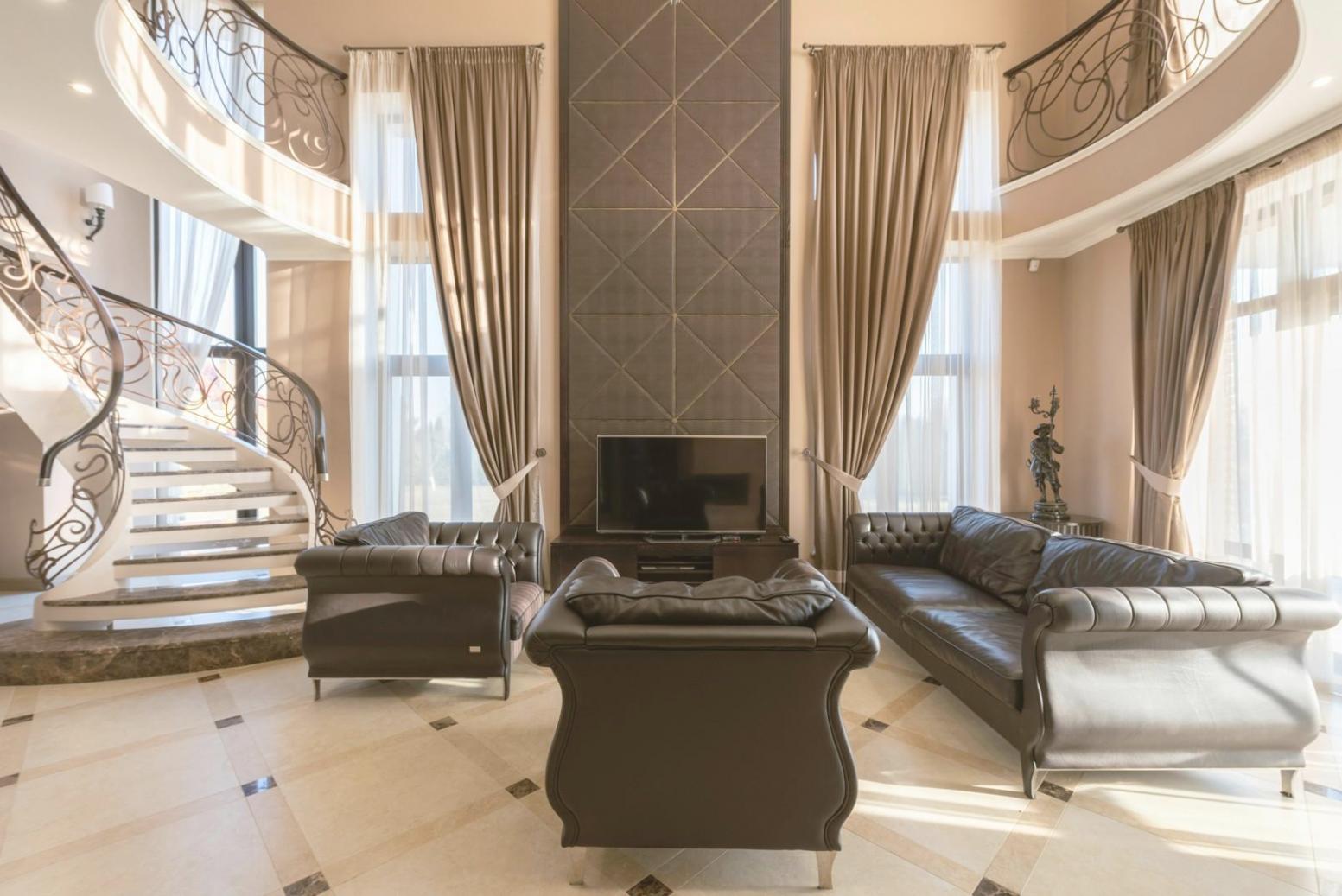 Student working on laptop reviewing real estate course materials