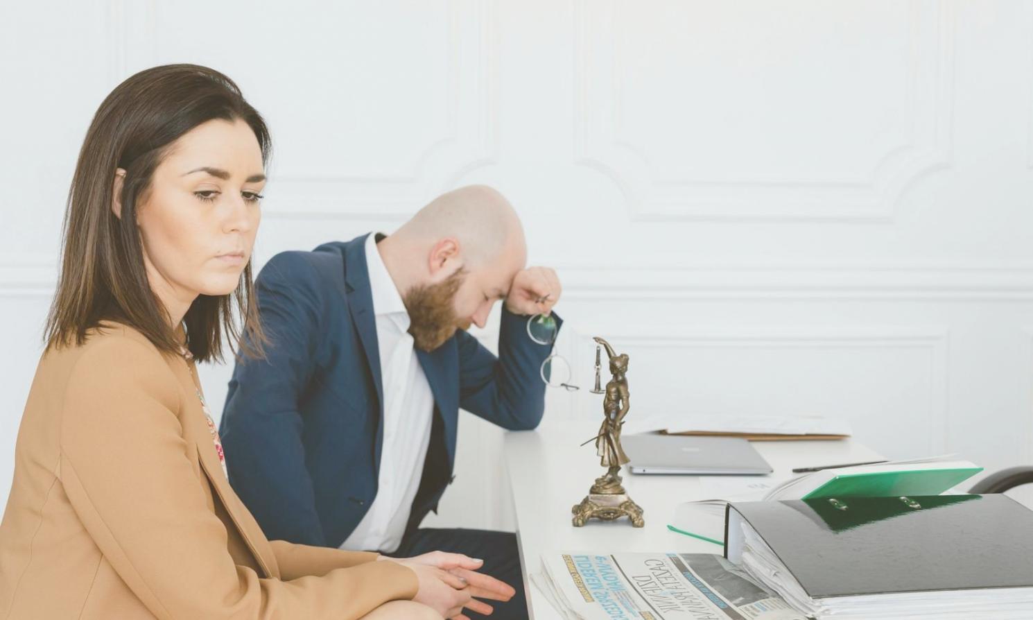 Small group discussion among real estate program participants reviewing case studies